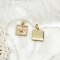 Detail of 18K gold plated square charm featuring fleur-de-lis relief and micro diamonds - Square Fleur-de-lis Style (Square Anchor)