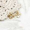 18K gold-plated fleur-de-lis pendant with inlaid zircons on a white lace background - Small Fleur-de-lis Style (Small Anchor)