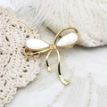 Elegant 18K gold plated bow brooch with natural mother of pearl inlay on lace background - Bowknot Shape