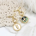 Detail of 18K gold-plated carrot pendants with natural white shell and abalone inlay - White Shell Carrot Style
