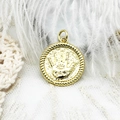 Macro shot of 18k gold plated Hamsa pendant with intricate rope border and eye detail - Round Palm