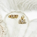 Detail of 18K gold micro-pave BFF and LOL pendants with zircons on white lace - BFF Letters