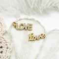 Gold plated micro-paved LOVE letter charms with shimmering cubic zirconia accents - LOVE Connector