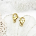 Detail van twee 18K vergulde karabijnsluitingen voor DIY sieraden maken en kettingverbindingen - Ronde Karabijnsluiting Stijl (2#)