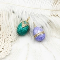 Detailed view of Faberge style 18K gold plated enamel egg pendants with zircon inlays - Purple Egg (14.3*26mm)