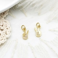 Detailed view of gold-plated V-sign charms with micro-pave zircons and honeycomb back - Hand Gesture