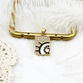 Rectangular gold pendant necklace with micro-pave crystals and blue evil eye detail - Square Sun Plaque