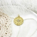 Detailed macro shot of an 18K gold plated celestial coin pendant with zodiac symbols - Twelve Constellations Octagram Plate / Twelve Zodiac Round Cards