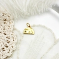 Macro detail of gold-plated semi-circle pendant with irregular hammered texture for DIY - Irregular Semi-Circular Style