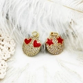 Macro shot of 18K gold plated micro-pave smiley charms with red heart and star details - Red Heart Smiley Face