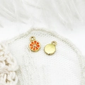 Detail view of 18K gold plated orange slice pendants for DIY jewelry crafting - Lemon