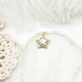 Star-shaped gold pendant with micro-pave cubic zirconia and starry center stone - Zirconia 3D Star