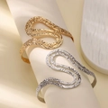 Minimalist wide open cuff bracelet with wavy textured 18K gold finish on a display - Wide Irregular Wave Style (B1738) / Gold