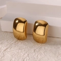 Macro detail of chunky gold plated square hoop earrings on a minimalist white display - Gold High Polish U-Shaped Stud Earrings (G9105362)