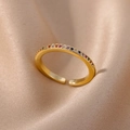 Adjustable gold ring with colorful cubic zirconia stones on champagne silk background - Gold Band With Gradient Rainbow Style (JZ4042G-6)