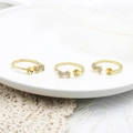 Detail of 18K gold-plated bow rings with zircon settings and pearl base for DIY jewelry - Bowknot Ring