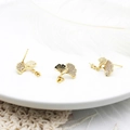 Detail of 18K gold plated ginkgo leaf earrings with black enamel and white zircon stones - Ginkgo Leaf Style