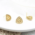 Detailed view of 18K gold plated heart-shaped ginkgo earrings with pavé white zircons - Triangular Geometric Style