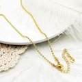Detail van 18K vergulde kralenketting met karabijnsluiting en hartvormige bedel aan het einde - No.7 Ball Bead Chain (Gold)