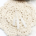 Three translucent silicone protective sleeves for jewelry tools on white lace background - Glue Tips