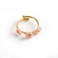 Golden open ring with three pink floral bead charms in a minimalist nature style - Pink