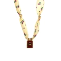 Floral fabric scarf necklace with Cancer zodiac crab pendant in golden finish - Cancer