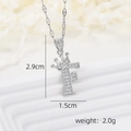 Macro shot of silver letter F crown pendant necklace with precise dimensions 2.9cm x 1.5cm - Silver F