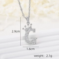 Detailed view of silver crown letter G pendant with measurements 2.9cm by 1.6cm - Silver G