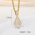 Detail showing dimensions 3.3x1.7cm of 18k gold plated letter A pendant with zircons - Letter A Pendant Necklace / Gold