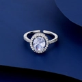 Detailed macro view of an oval halo zircon ring with an adjustable open silver band - Oval Halo Style (C)