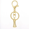 Close-up of 18K gold plated lobster clasp and swivel ring with a polished metal surface - Gold - Style I
