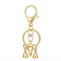 Detailed macro view of 18K gold plated letter M keychain with lobster clasp - Gold - Letter M