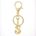 Close-up of 18K gold plated letter S keychain with lobster clasp and metal ring - Gold - Letter S