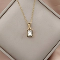 18K gold plated necklace with emerald cut clear zircon pendant on jewelry box - Ivory