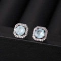 Elegante vierkante oorknopjes met lichtblauwe steen en zilveren zirkonia details - Ijsbloem Lichtblauw