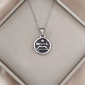Detailed view of silver Sagittarius zodiac pendant with black enamel in a luxury box - Silver-Sagittarius