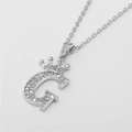 Iced out crown letter G pendant necklace with cubic zirconia and silver finish chain - Letter G / Silver