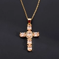 Elegant gold cross pendant necklace featuring champagne zircon stones on black background - Champagne
