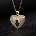 Collana con pendente a cuore in oro 18 carati con zirconi lucenti su sfondo nero opaco - G (Ciondolo Singolo)