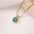 Exquisite gold pendant necklace featuring a sea blue zircon stone with shimmering white gems - Pendant Only (Without Chain) / Sapphire Blue