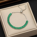 Detail of adjustable silver sliding clasp on baguette-cut green zircon bracelet - Emerald