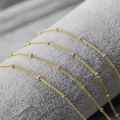 Elegante vergoldete Kugelkette aus Kupfer mit feinen Perlen für Damen Schmuck - Perlenkette / Gold