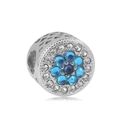 Detailed macro view of silver flower charm with blue stones and heart cut-outs - Dark Blue Floral Micro-set Style (19)
