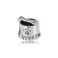 Detailed macro view of 316L steel dog bowl bead with blue zircon bone and Woof engraving - Blue Dog Bowl Style