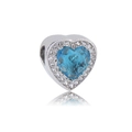 Detailed macro view of heart-shaped 316L steel bead with a blue gemstone and crystals - Dark Blue Heart (N0.3)