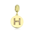 Macro shot of gold pendant with letter H featuring paved rhinestones on white background - Letter H