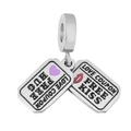 Macro shot of silver charms with Love Coupon, Free Hug, and Free Kiss engravings - Emotion Tag Pendant (39)