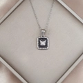 Detail of vintage square pendant with silver butterfly on black enamel in gift box - Butterfly Square Hammered Style / Peach