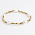 Elegantes goldenes Perlenarmband mit fünf weißen ovalen Perlen aus rostfreiem Edelstahl - Ovale Perle Metallperle Stil (BC596-8)