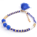 Detail of bohemian beaded bracelet featuring dark blue faceted beads and silk tassel - BC170-15 Dark Blue Tassel